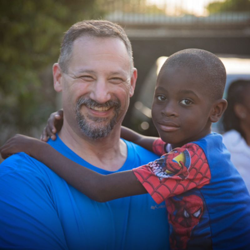 Chanje founder Dave Brodsky with one of the kids helped by Chanje Movement